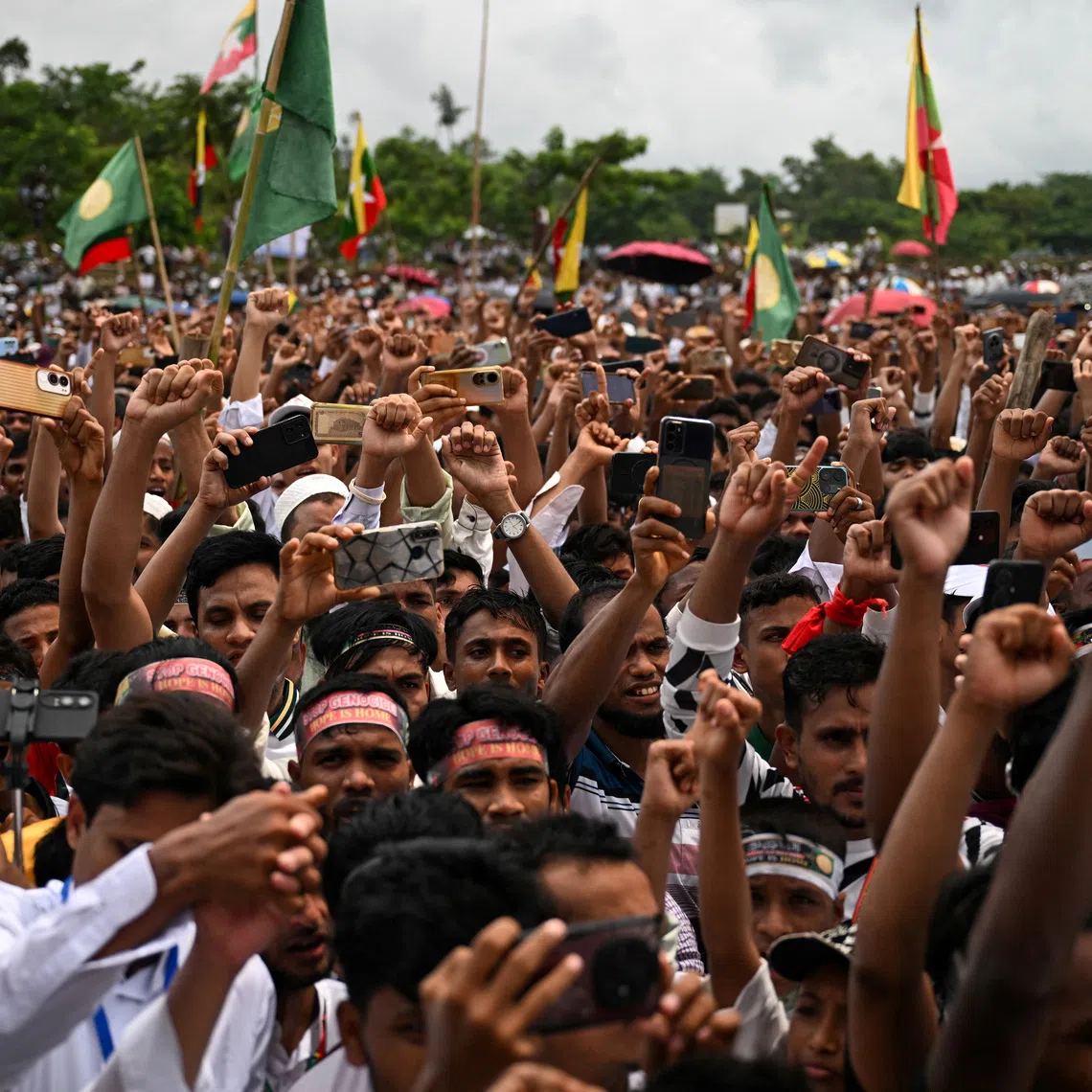 Rohingya refugees take part in a protest rally inside a refugee camp to mark the ninth-year anniversary of their exodus, in Cox’s Bazar, Bangladesh, on Aug 25.