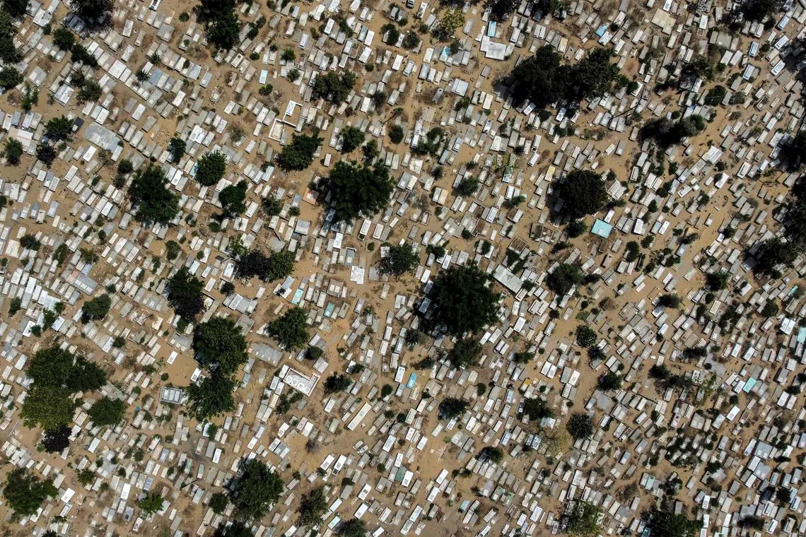 An aerial view of a cemetery in Beit Lahia in the northern Gaza Strip, following a ceasefire ending five days of deadly fighting between Israel and the Palestinian Islamic Jihad militant group taken on May 15. 