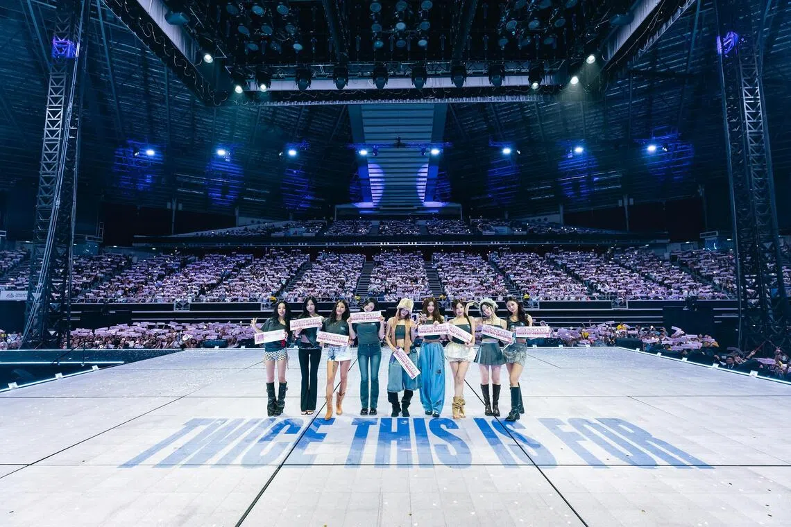 Twice's (from left) Chaeyoung, Mina, Jihyo, Jeongyeon, Momo, Sana, Nayeon, Dahyun and Tzuyu performed to a capacity crowd of 11,000 at the Singapore Indoor Stadium on Oct 11. 