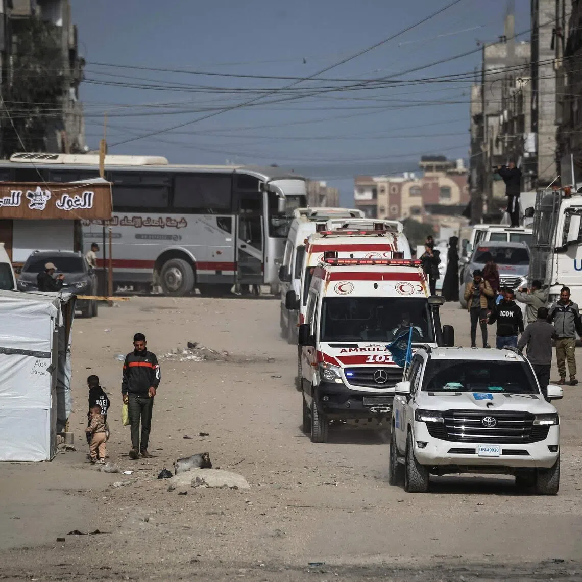 A convoy transporting Palestinians heads towards the Rafah border crossing with Egypt after it opens for the first time since the US-Israel war with Iran started, in Khan Yunis on March 19, 2026. 