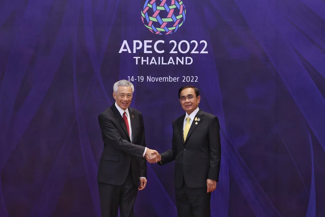 Prime Minister Lee Hsien Loong meeting Thai Prime Minister Prayut Chan-o-cha at the 29th APEC Economic Leaders' Meeting in Bangkok on Nov 18, 2022.