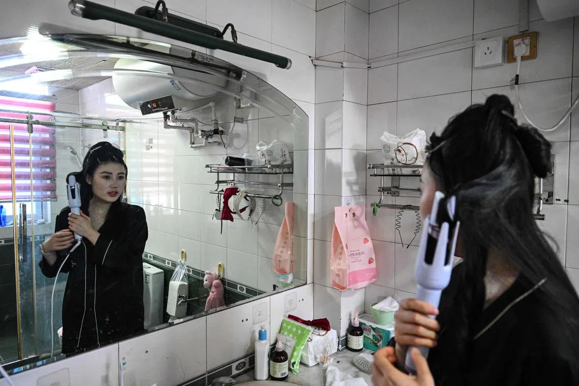 Aspiring actress Guo Ting gets ready for an audition in Hengdian, Zhejiang, China.. Guo is part of a trend of young Chinese giving up the traditional aspiration of a stable, mainstream job in exchange for alternative careers and a chance at self-fulfillment. 