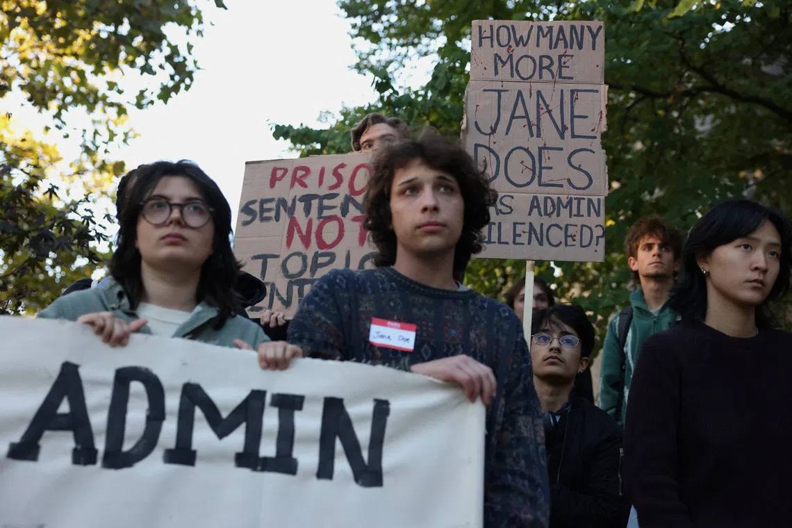People attend a Justice for Survivors rally outside of the Day Hall administrative building at Cornell University in Ithaca, New York, US, October 5, 2026. REUTERS/Lauren Petracca