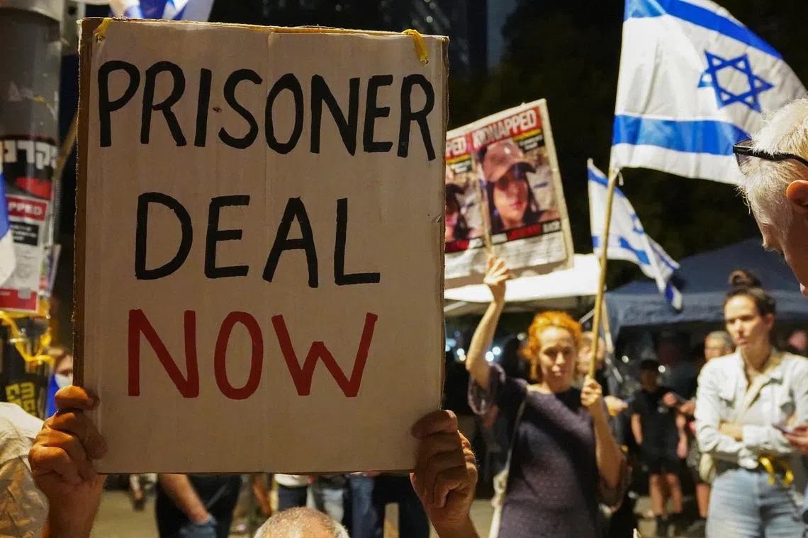 People showing support and solidarity with the families of Hamas' hostages in Tel Aviv, Israel, on Oct 21.