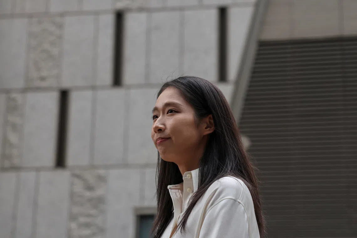 Hong Kong Olympic gold medallist Vivian Kong looks on as she speaks to the media before submitting her nomination form to run for the tourism functional constituency in the Legislative Council election, in Hong Kong, China, November 3, 2025. REUTERS/Tyrone Siu
