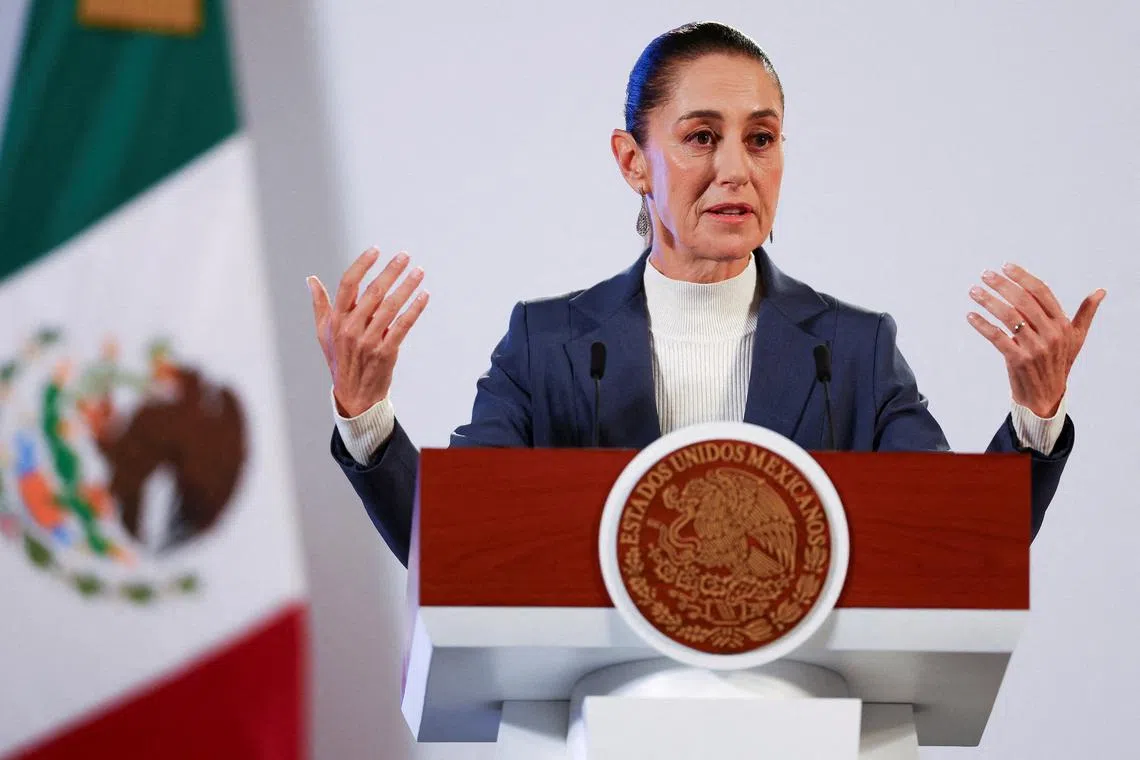 FILE PHOTO: Mexico's President Claudia Sheinbaum holds her first press conference at the National Palace, in Mexico City, Mexico, October 2, 2024. REUTERS/Raquel Cunha//File Photo