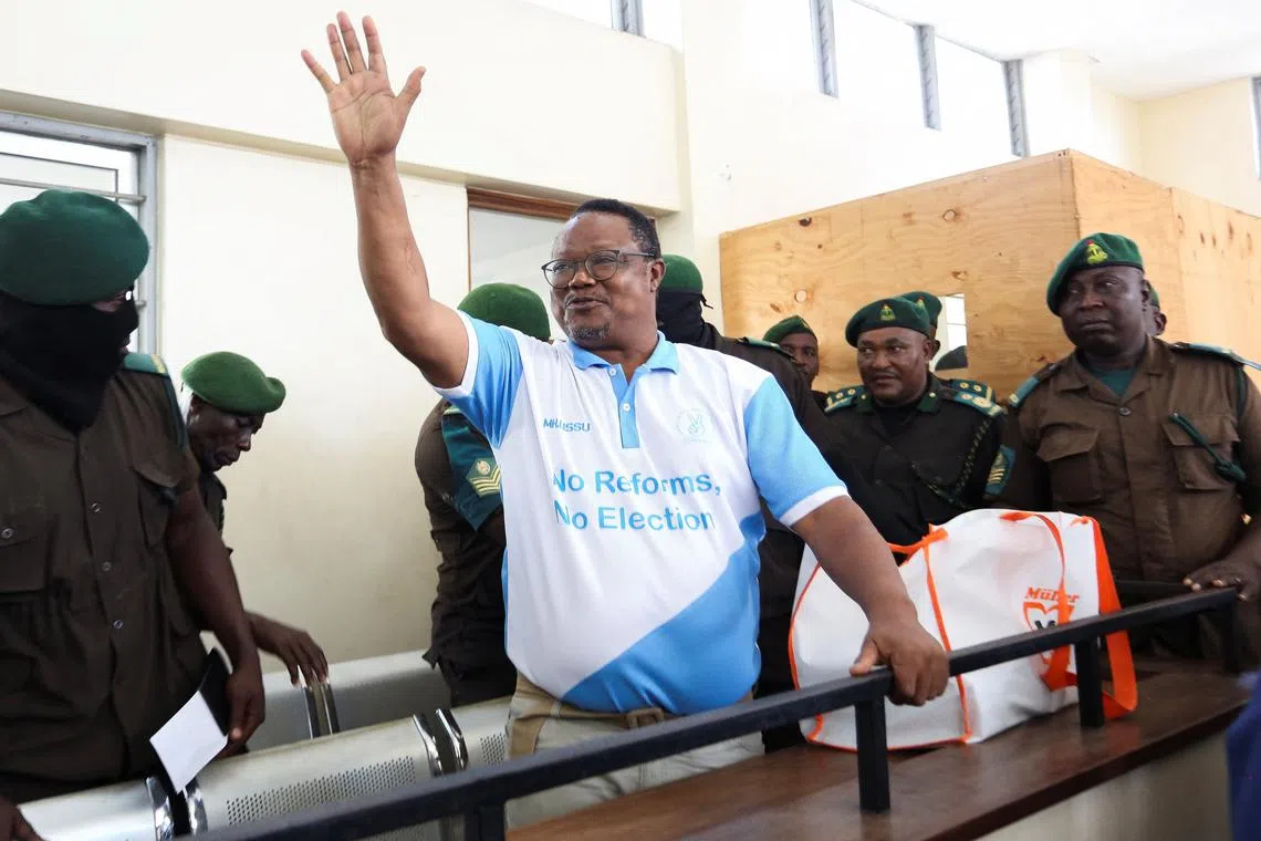 Tanzanian opposition leader and former presidential candidate of CHADEMA party Tundu Lissu waves to his supporters as he arrives at the Kisutu Resident Magistrate Court in Dar es Salaam, Tanzania May 19, 2025. REUTERS/Emmanuel Herman/File Photo