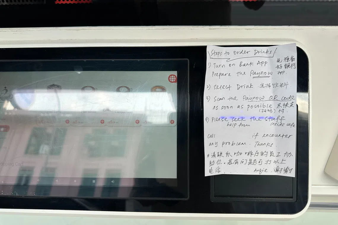 Handwritten instructions were next to the Fun Coffee machine, with directions on how customers can scan a QR code to make payment.
