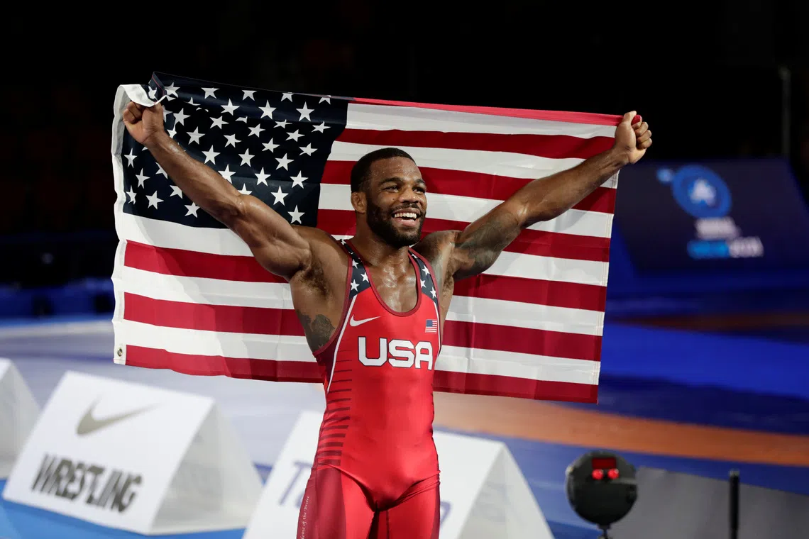 Wrestling - Wrestling World Championships - Oslo, Norway - October 4, 2021 Jordan Ernest Burroughs of the United States celebrates after winning the final in 79kg Berit Roald/NTB via REUTERS