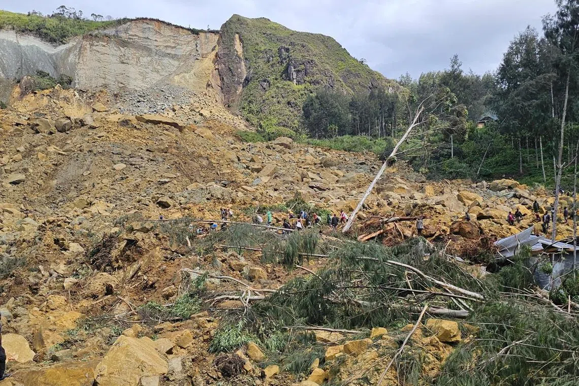FILE PHOTO: View of the damage after a landslide in Maip Mulitaka, Enga province, Papua New Guinea May 24, 2024 in this obtained image. Emmanuel Eralia via REUTERS/File Photo