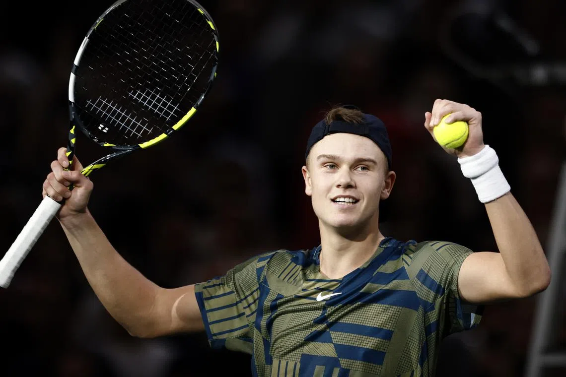 Denmark's Holger Rune celebrates winning his semi final against Felix Auger-Aliassime of Canada.
