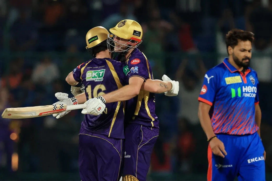 Cricket - Indian Premier League - IPL - Delhi Capitals v Kolkata Knight Riders - Arun Jaitley Stadium, New Delhi, India - May 8, 2026 Kolkata Knight Riders' Finn Allen celebrates after reaching his century and winning the match with Cameron Green REUTERS/Adnan Abidi