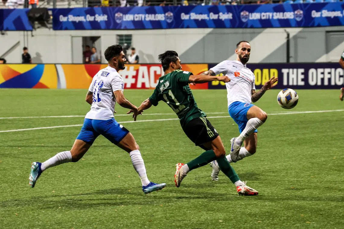 Players at the Asian Champions League game between Lion City Sailors and Jeonbuk Hyundai Motors at Jalan Besar Stadium. 