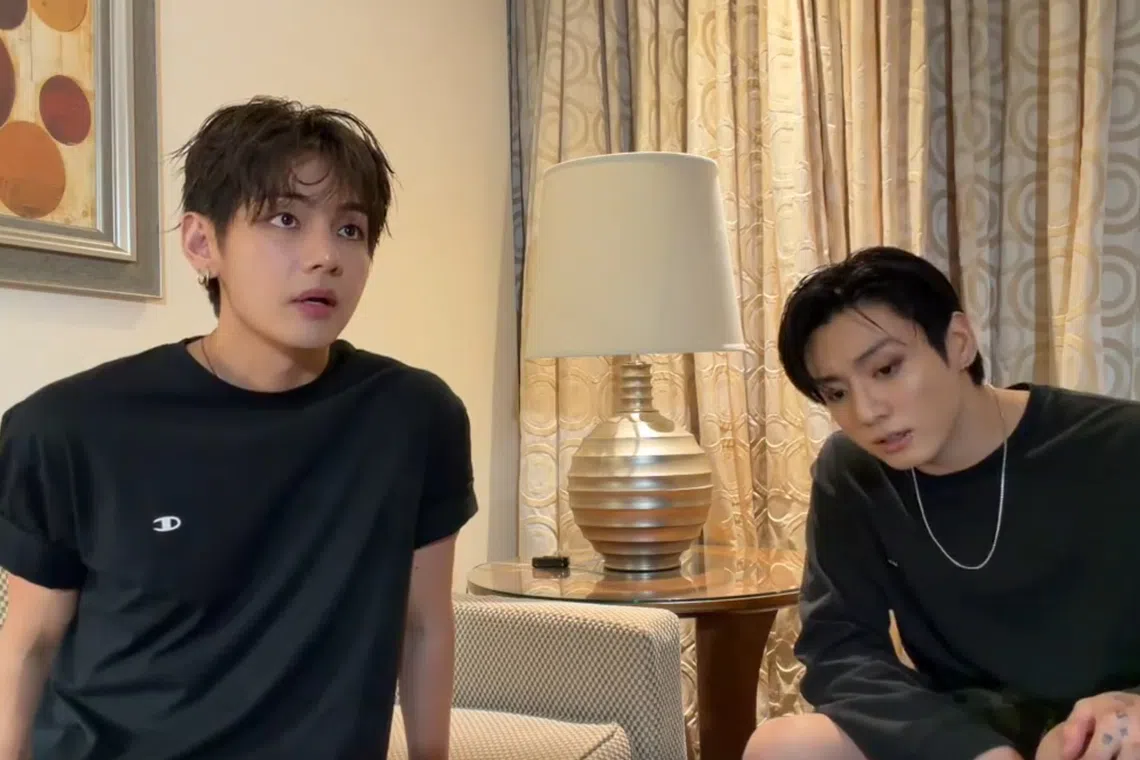 V (left) made the disclosure during a livestream on Weverse with bandmate Jungkook.