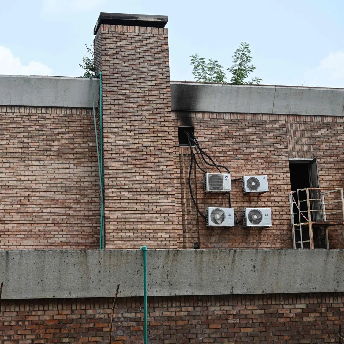 A preliminary report found the deadly blaze had engulfed the unit “within approximately two minutes”.