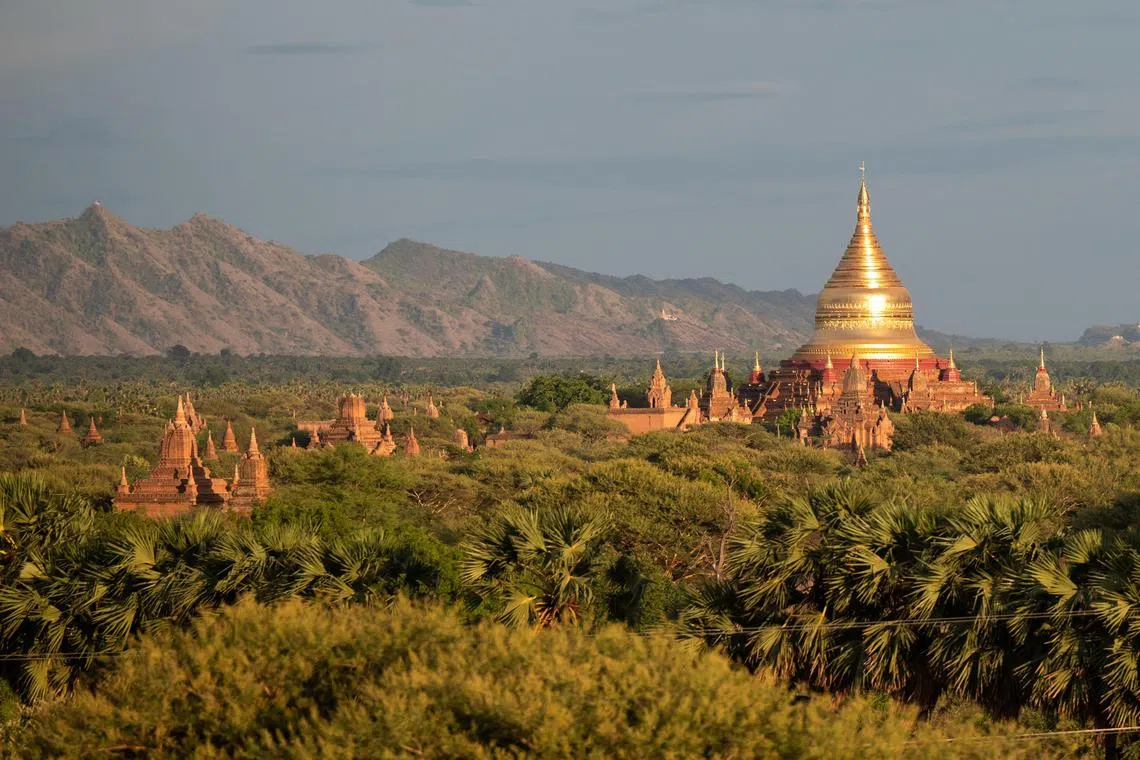 The domes and spires of Myanmar's temple city of Bagan mark an island of calm in the country's raging civil war, but with conflict keeping tourists away locals are struggling to make ends meet.  