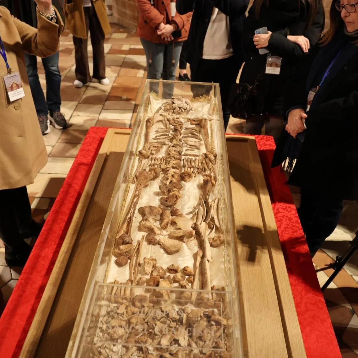 The body of St Francis of Assisi is displayed to the public for the first time in history in a glass shrine in front of the altar of the Lower Basilica in Assisi, Italy.
