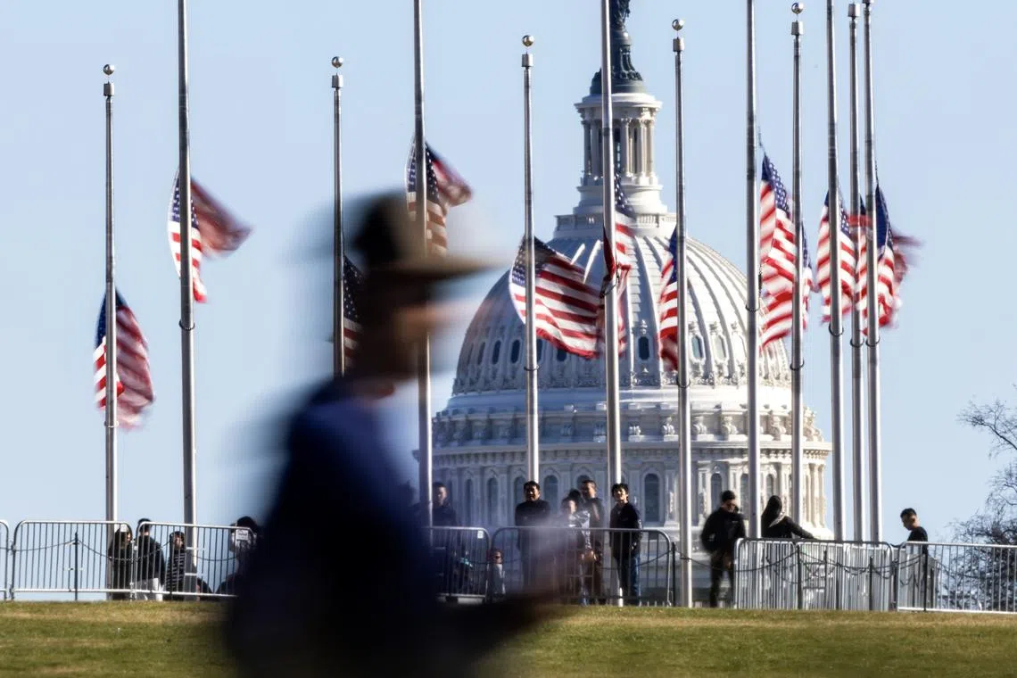 US flags flying at half-staff following the death of former US President Jimmy Carter, in Washington, DC, on Dec 30.