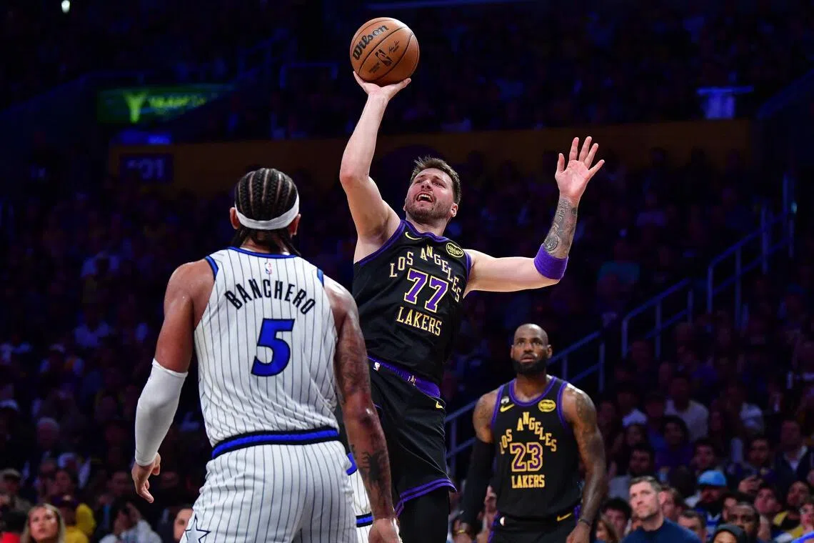 Los Angeles Lakers guard Luka Doncic shooting over Paolo Banchero during the Orlando Magic's 110-109 NBA win at Crypto.com Arena on Feb 24, 2026.