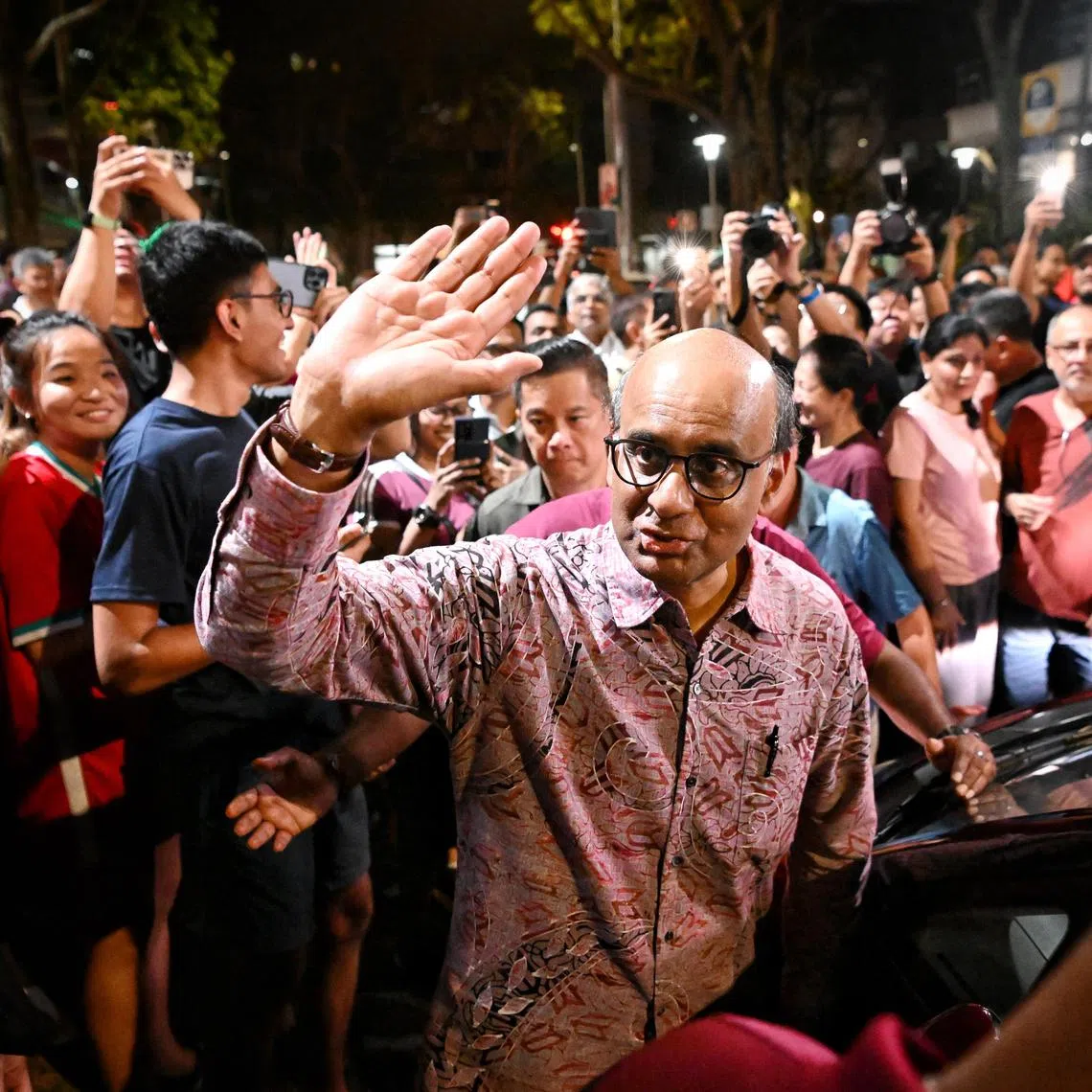 President-elect Tharman Shanmugaratnam together with his wife, Ms Jane Ittogi meeting his supporters at the Taman Jurong Market & Food Centre located at Yung Sheng Road on Sep 1, 2023. This was shortly before the sample count showed Mr Tharman clinching the presidency with a landslide win.