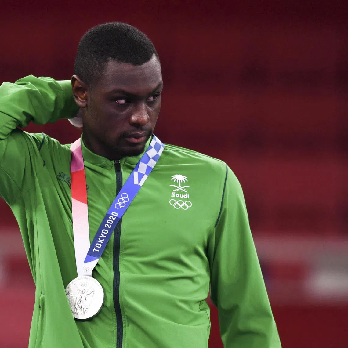 FILE PHOTO: Tokyo 2020 Olympics - Karate - Men's +75kg Kumite - Medal Ceremony - Nippon Budokan, Tokyo, Japan - August 7, 2021. Silver medallist Tareg Hamedi of Saudi Arabia looks on. REUTERS/Annegret Hilse/File Photo
