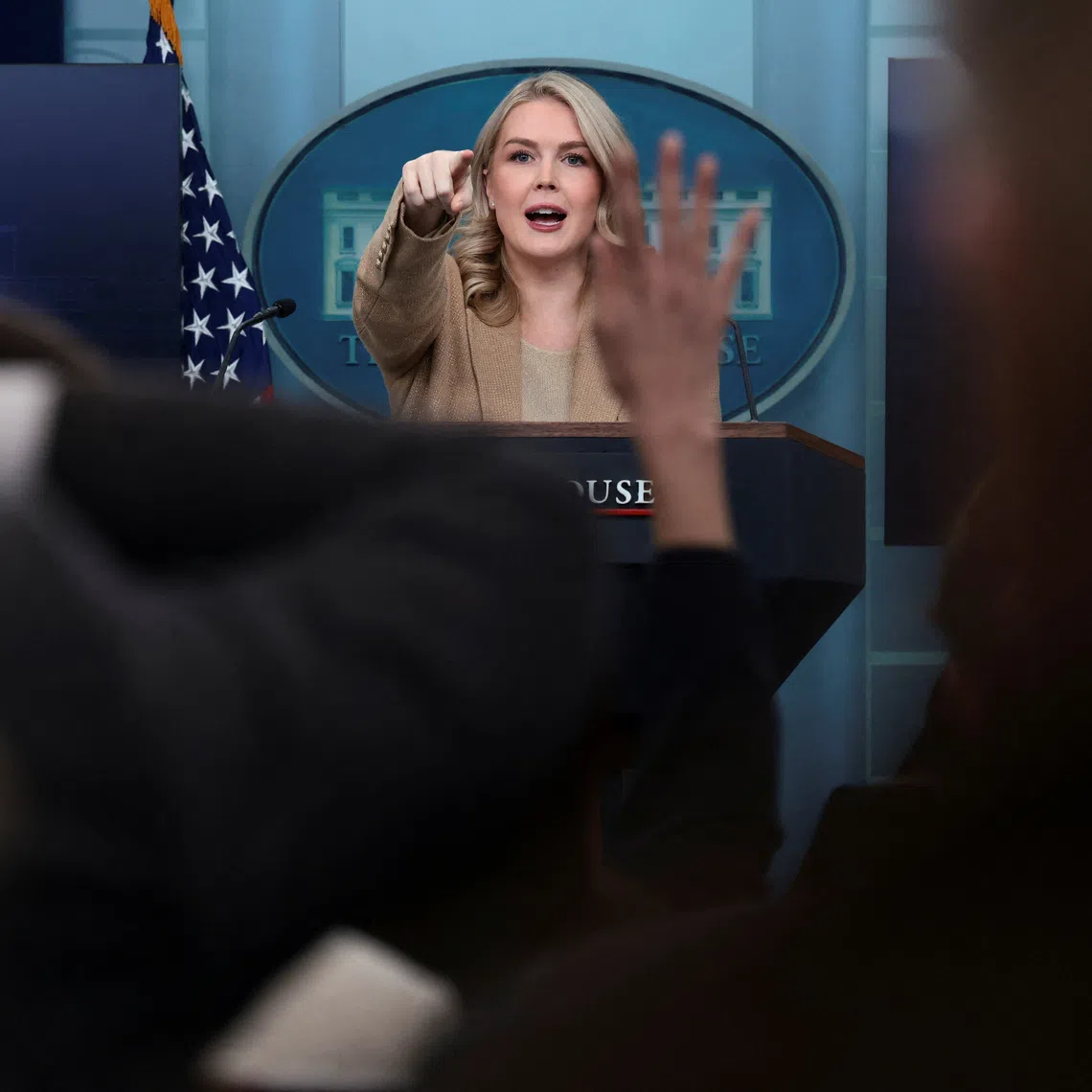 White House Press Secretary Karoline Leavitt points while she holds a press briefing at the White House, in Washington, D.C., U.S., December 1, 2025. REUTERS/Evelyn Hockstein