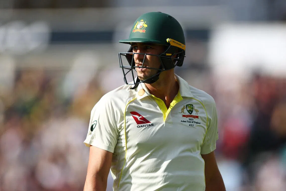 FILE PHOTO: Cricket - Ashes - Fifth Test - England v Australia - The Oval, London, Britain - July 31, 2023 Australia's Pat Cummins walks after losing his wicket, caught by England's Ben Stokes off the bowling of Moeen Ali Action Images via Reuters/Andrew Boyers/File Photo