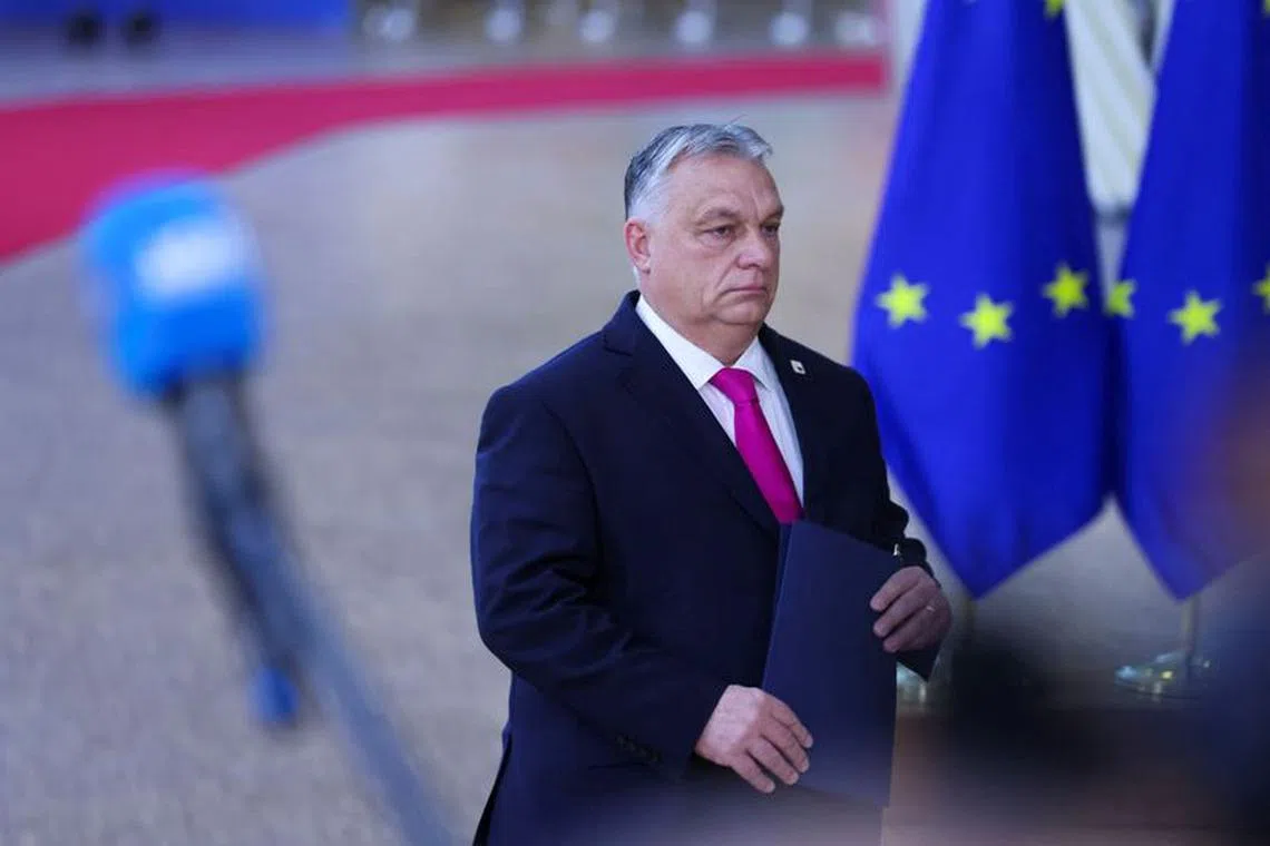 Hungarian Prime Minister Viktor Orban walks at a European Union leaders' summit, in Brussels, Belgium December 14, 2023. REUTERS/Johanna Geron