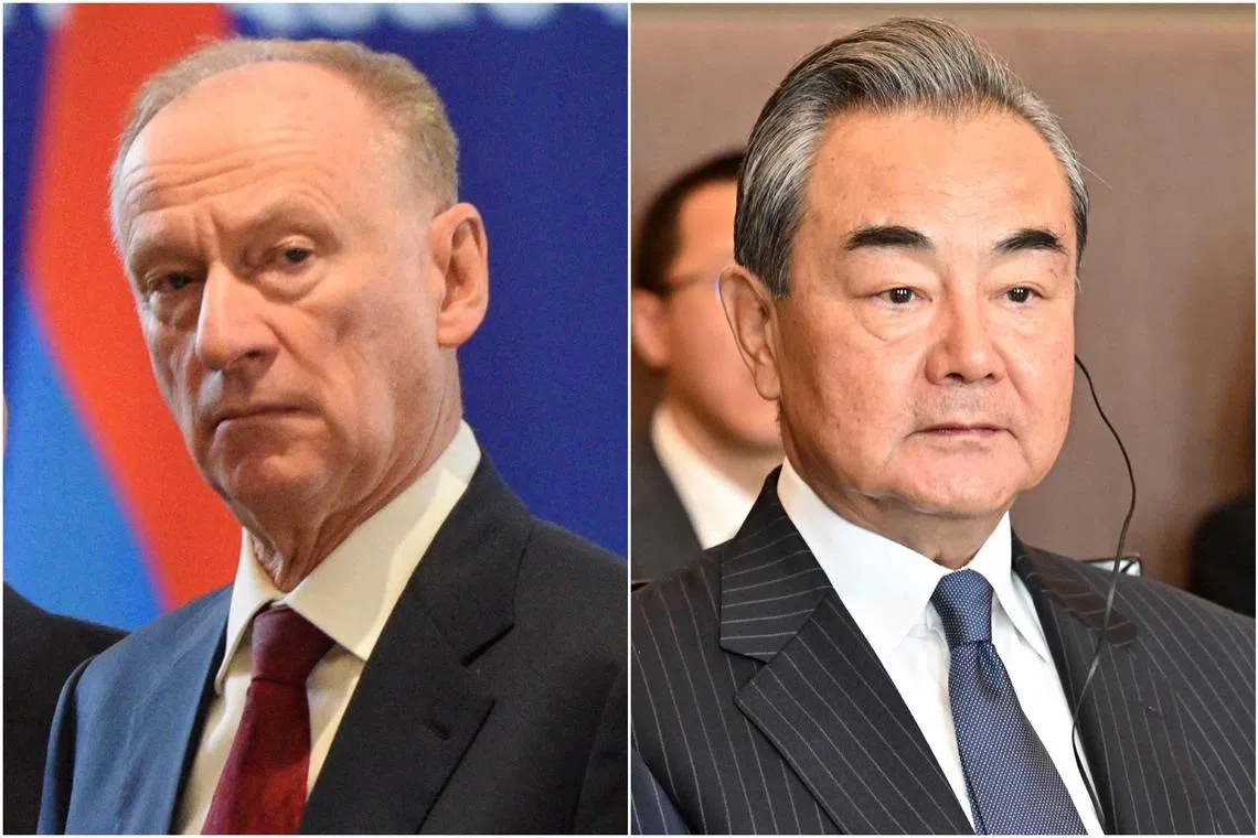 Mr Nikolai Patrushev (left) also told Mr Wang Yi that Moscow backed China’s position over Taiwan, Hong Kong and Xinjiang.