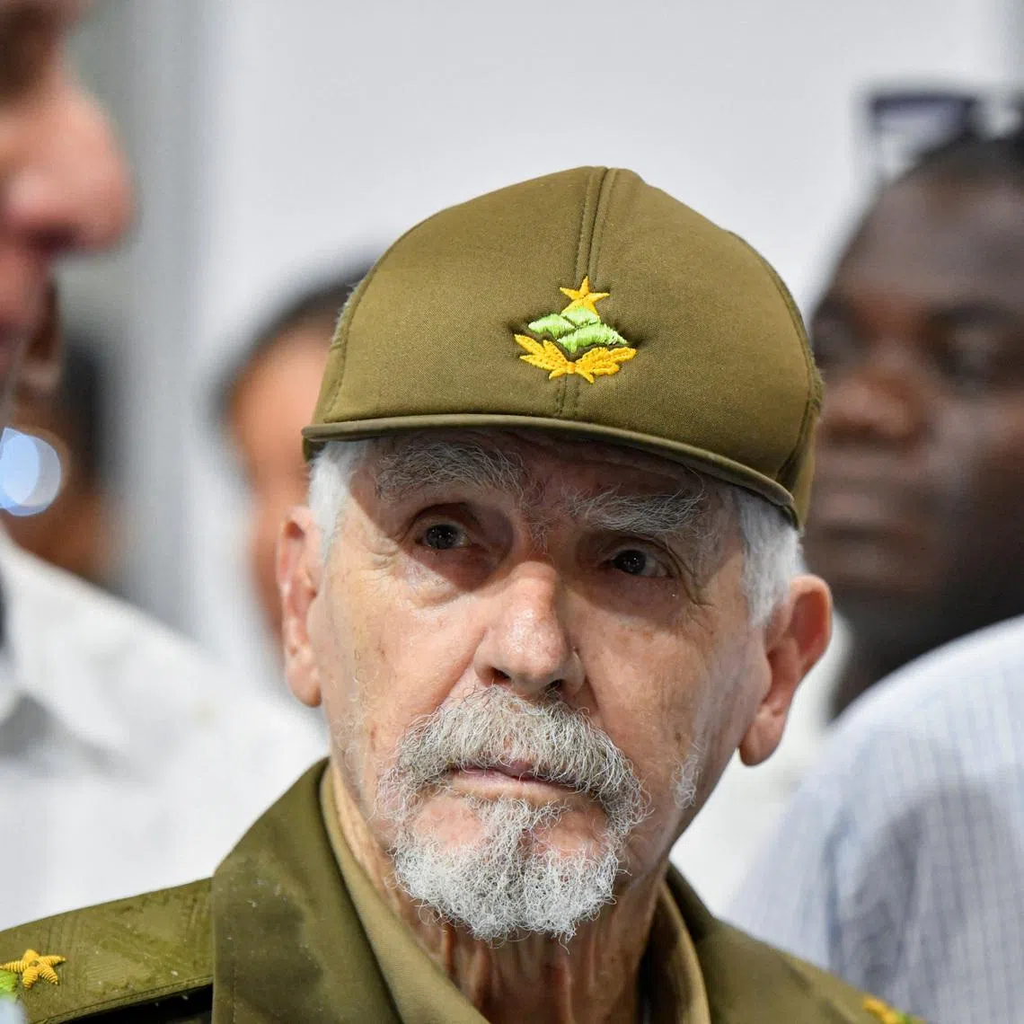 FILE PHOTO: Commander of the Revolution and Cuba's former Vice President Ramiro Valdes looks at Cuba's President Miguel Diaz-Canel during a visit to the 3rd International Exhibition of Renewable Energy and Energy Efficiency, in Havana, Cuba September 20, 2024. REUTERS/Norlys Perez/File Photo