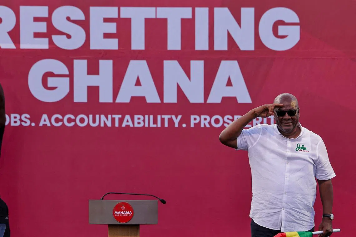 FILE PHOTO: National Democratic Congress (NDC) presidential candidate and former Ghanaian President John Dramani Mahama salutes supporters during  his final election campaign rally in Accra, Ghana December 5, 2024. REUTERS/Zohra Bensemra/File Photo