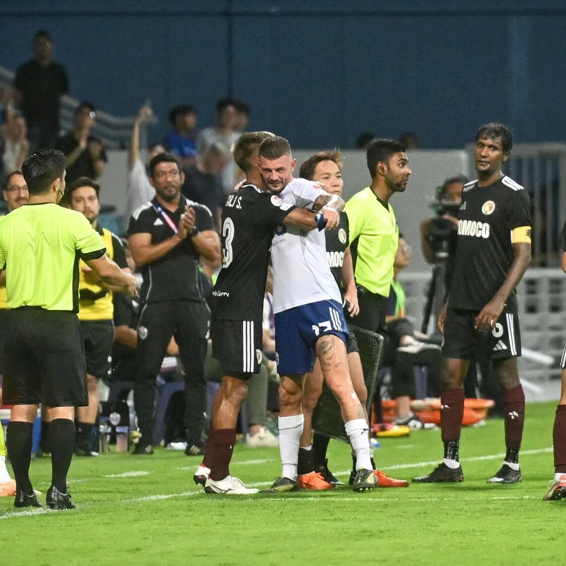 Departing Lion City Sailors winger Maxime Lestienne is cheered on by fans and players as he makes his way off the pitch after being substituted. 