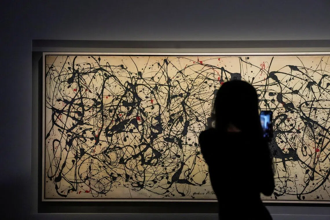 With its black drips of paint accented by touches of red on a huge canvas spanning over 3m, Pollock’s “Number 7A, 1948“ sold for US$181.2 million, including fees.
