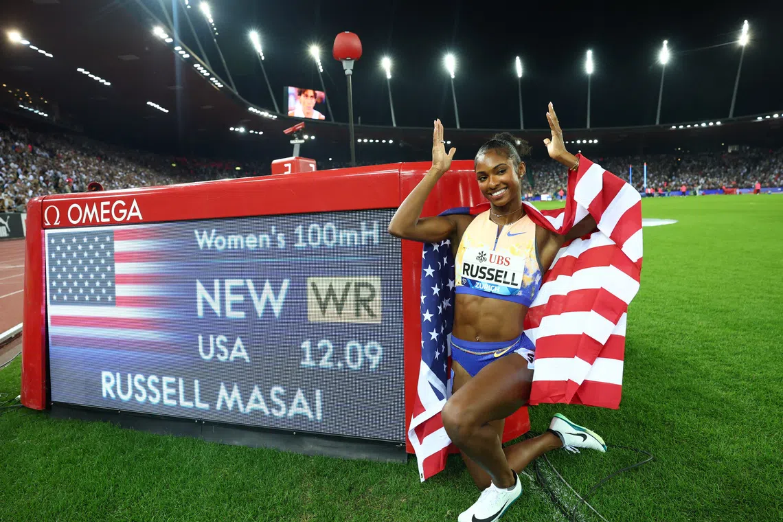 Brazil’s Alison dos Santos, American Masai Russell race to world hurdles records in Zurich
