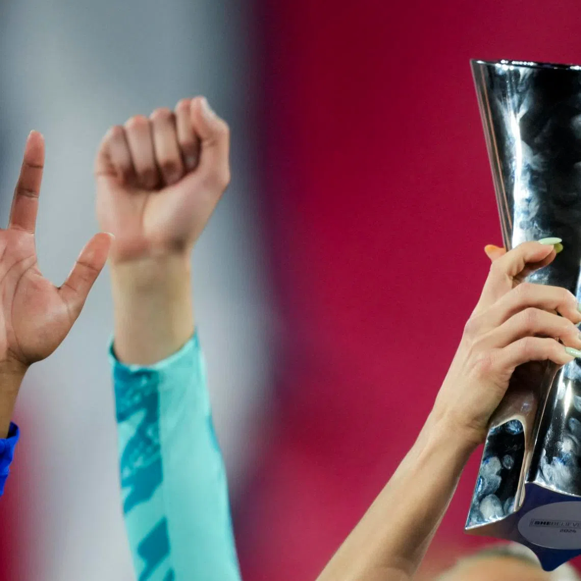 FILE PHOTO: Apr 9, 2024; Columbus, Ohio, USA;  United States players hold the trophy as they celebrate after defeating Canada in penalty kicks at Lower.com Field. Mandatory Credit: Aaron Doster-USA TODAY Sports/File Photo