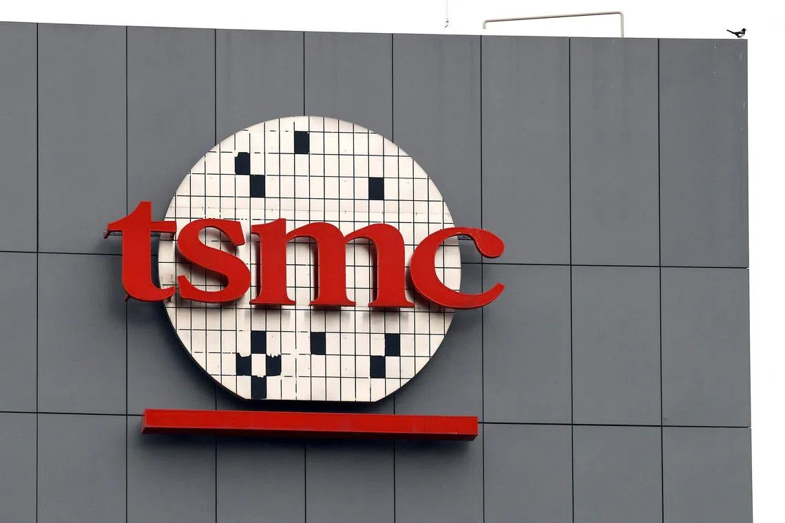 Strong sales of advanced chips helped TSMC defy a broader industry downturn but it cut its 2023 capital expenditure plan, underscoring worsening demand outlook.