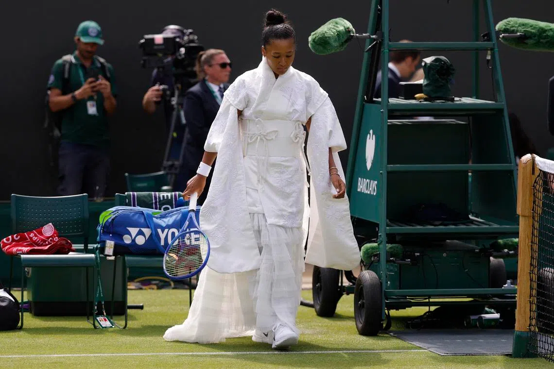 Tennis - Wimbledon - All England Lawn Tennis and Croquet Club, London, Britain - June 29, 2026 Japan's Naomi Osaka arrives at the court ahead of her first round match against France's Elsa Jacquemot REUTERS/Andrew Couldridge