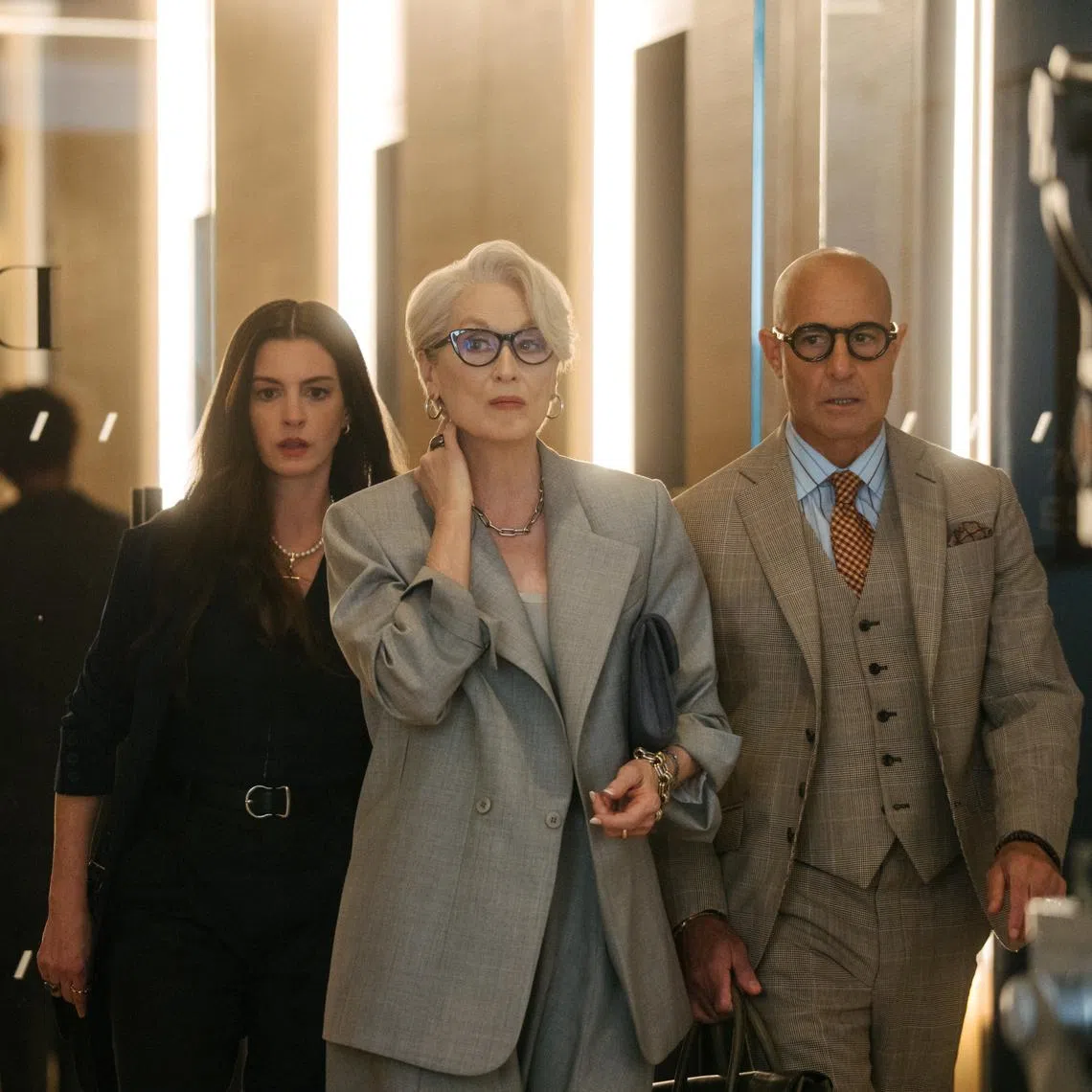 (From lef) Anne Hathaway, Meryl Streep and Stanley Tucci in The Devil Wears Prada 2.