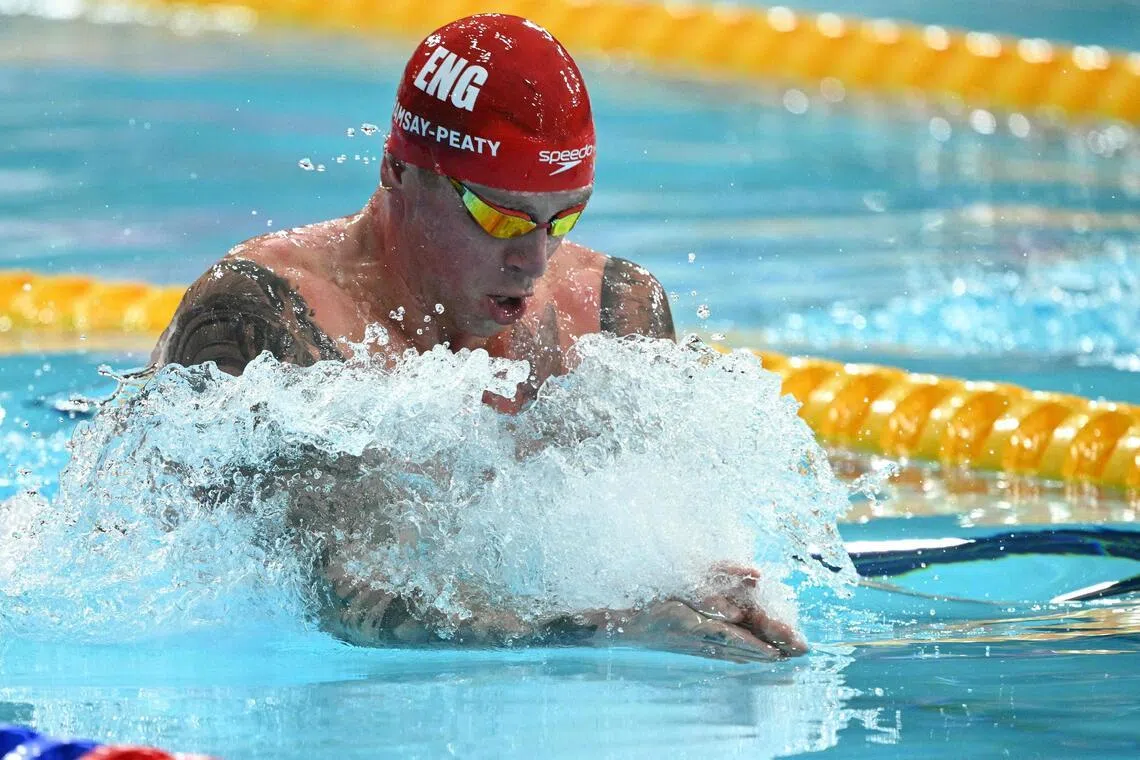 England's Adam Ramsay-Peaty competes in the Men's 50m Breaststroke Semi-Final during the swimming event at the Tollcross International Swimming Centre in Glasgow, on day three of the Commonwealth Games in Glasgow, Scotland, on July 26, 2026. (Photo by Oli SCARFF / AFP)