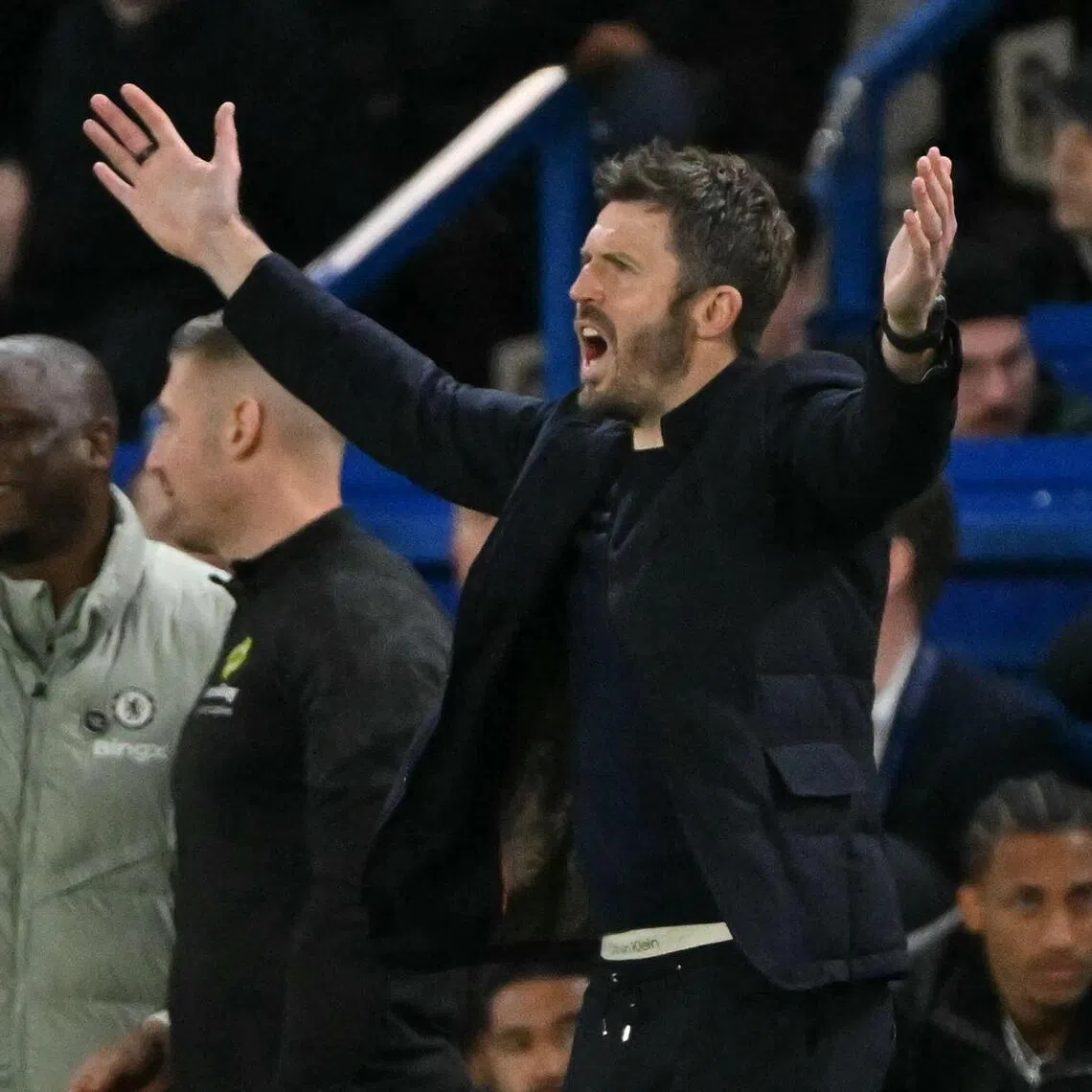 Manchester United's English interim manager Michael Carrick gesturing on the touchline during the 1-0 English Premier League win over Chelsea at Stamford Bridge in London on April 18, 2026.