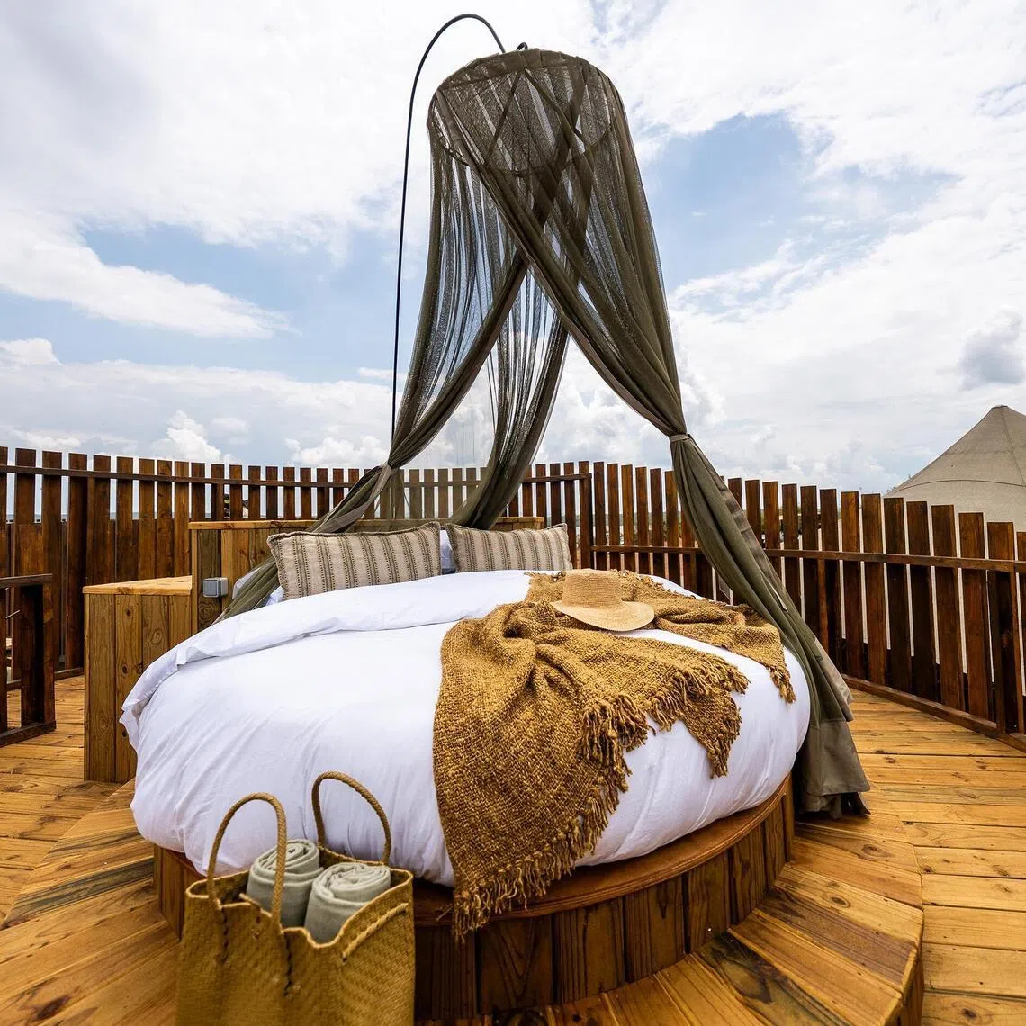 Guests can opt to sleep under the stars at Wilderness Magashi Peninsula, among a few new luxury lodges turning Rwanda into a multi-stop safari circuit.