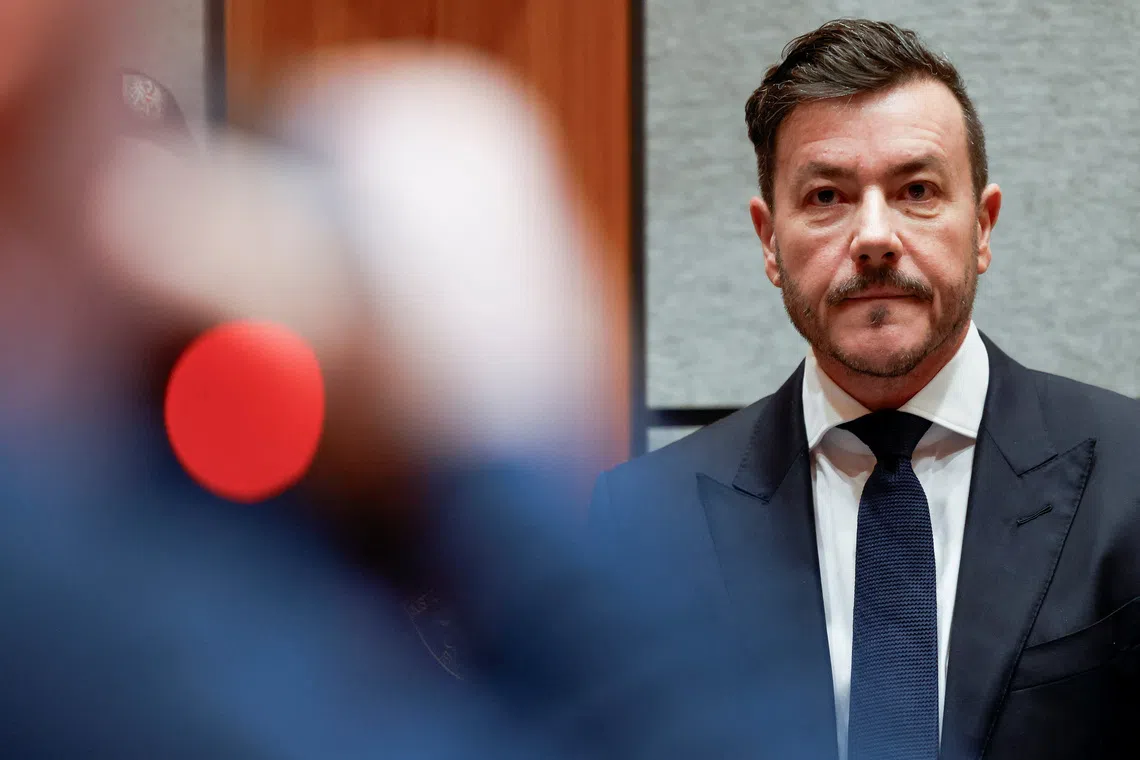 Austrian former property tycoon Rene Benko awaits the start of his second insolvency fraud trial in Innsbruck, Austria, December 10, 2025. REUTERS/Michaela Stache