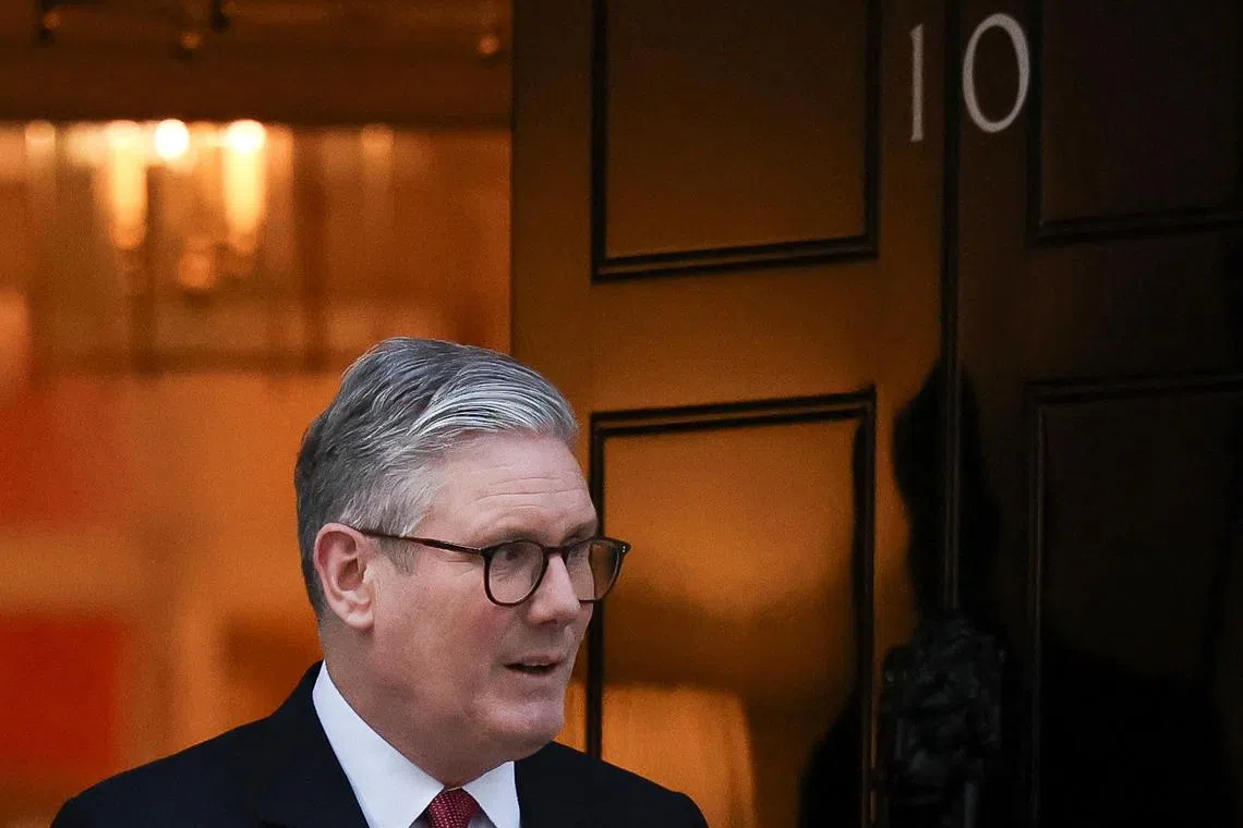 British Prime Minister Keir Starmer waits to meet Ukrainian President Volodymyr Zelenskiy at Downing Street in London, Britain, March 1, 2025. REUTERS/Temilade Adelaja