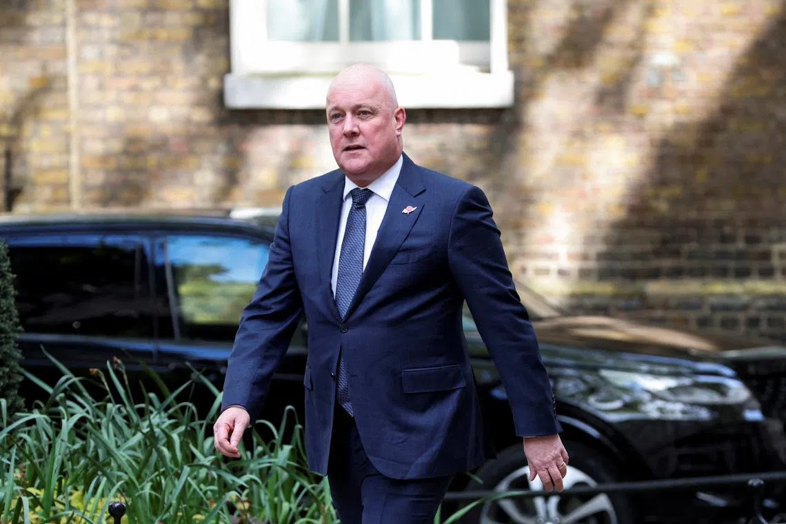 FILE PHOTO: New Zealand's Prime Minister Christopher Luxon walks at Downing Street to meet Britain's Prime Minister Keir Starmer, in London, Britain, April 22, 2025. REUTERS/Belinda Jiao/File Photo