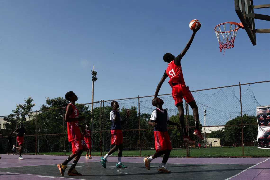 Basketball players train during the Legacy Summer Camp, organised by SEED Project alumnus Pape Latyr Gnigu, in Dakar, Senegal, September 30, 2026. REUTERS/Misper Apawu