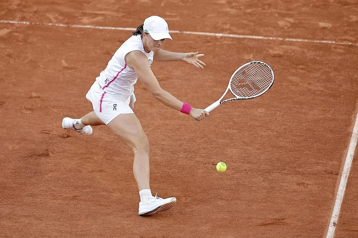Iga Swiatek of Poland in action in her Women's Singles 4th round match against Lesia Tsurenko of Ukraine,