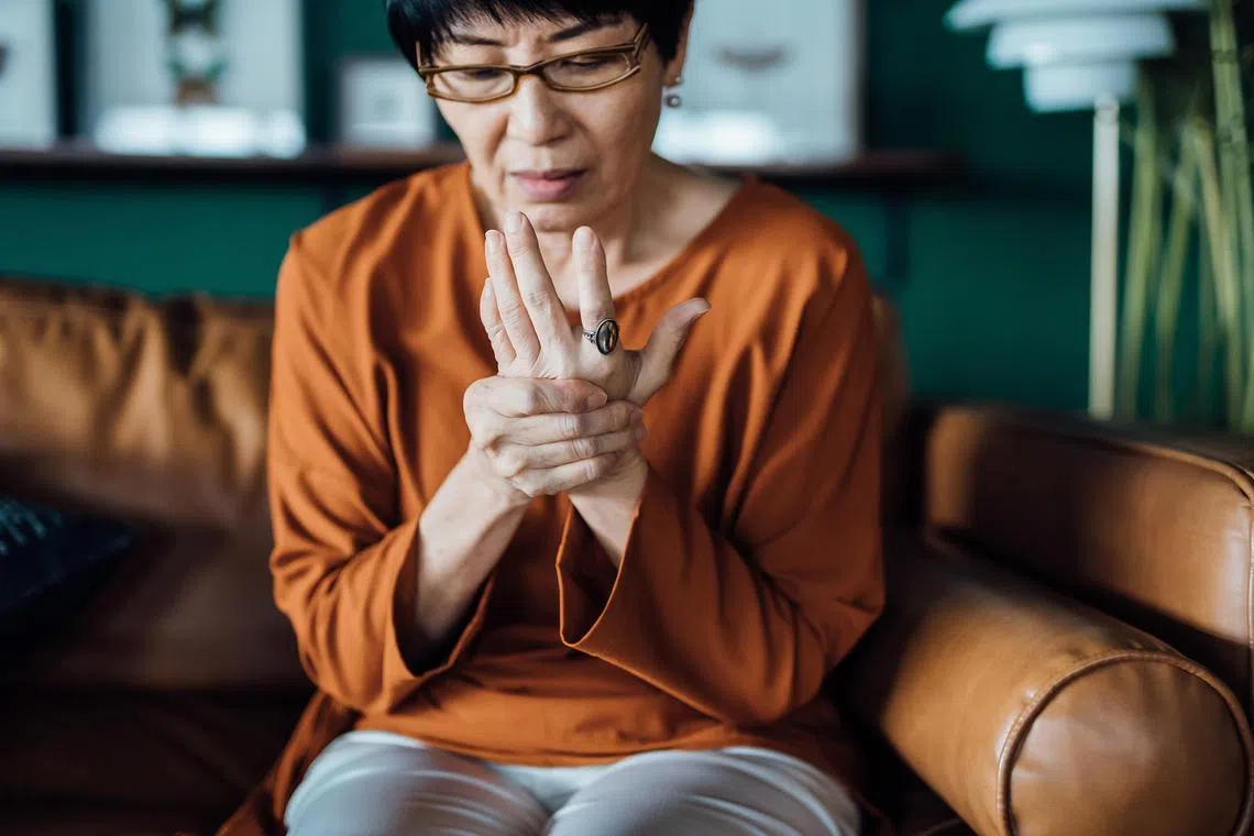 anremedy - Senior Asian woman rubbing her hands in discomfort, suffering from arthritis in her hand while sitting on sofa at home. Elderly and health issues concept

Credit: ISTOCK PHOTO