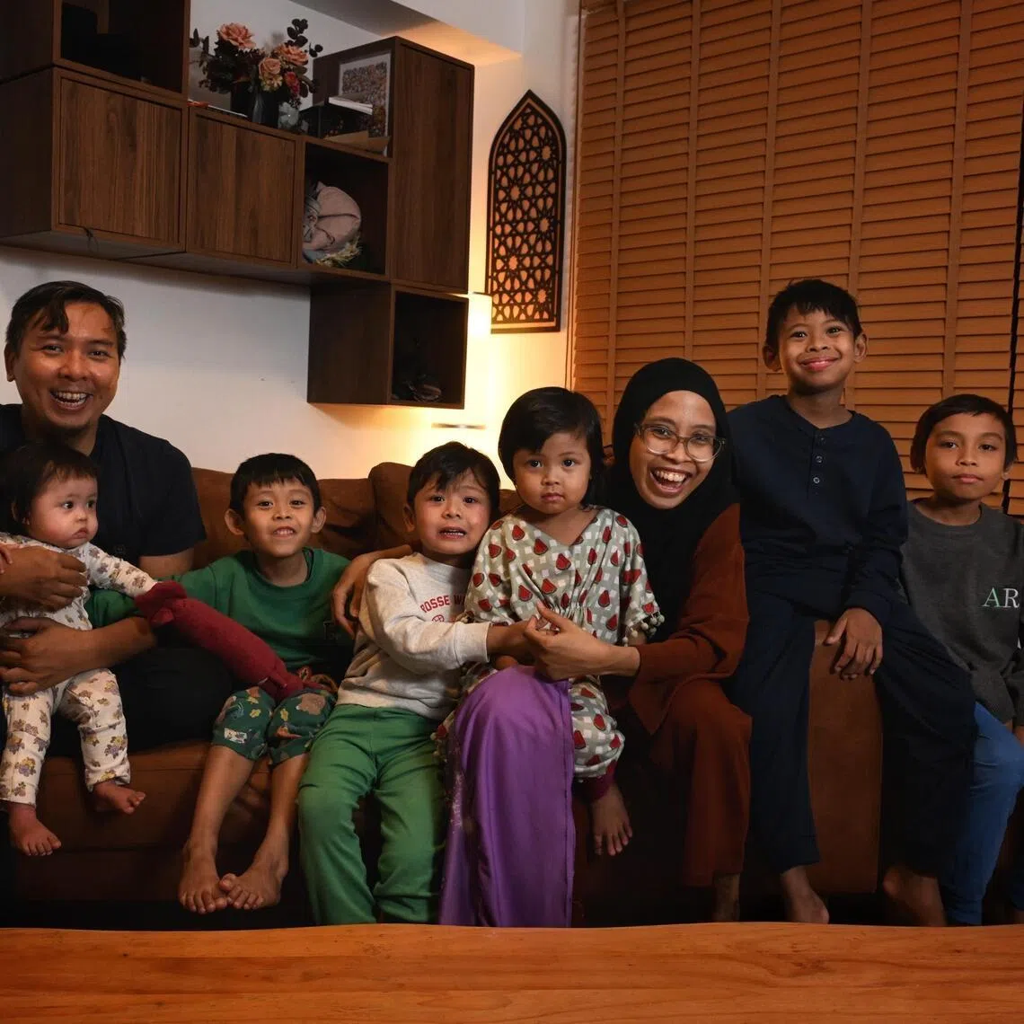 Amirudin Mohd Zain, 39, and his wife, Aszafirah Abu, 37, and their children on May 21.