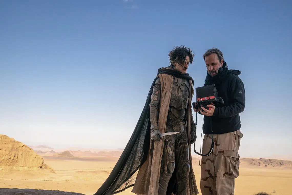 Denis Villeneuve (right) and Timothee Chalamet on the set of Dune: Part Two.
