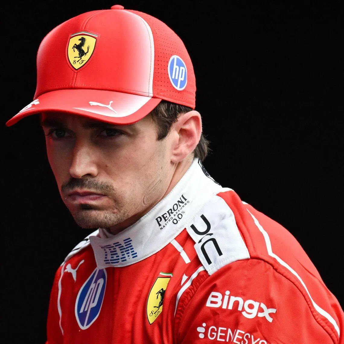 Second-placed Ferrari driver Charles Leclerc reacts before the podium ceremony after competing in the Formula One Belgian Grand Prix at the Spa-Francorchamps circuit.